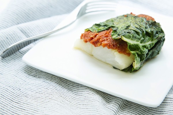 Chard-wrapped cod with sun-dried tomato tapenade 