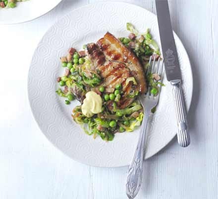 Chargrilled pork chops with braised lettuce and peas