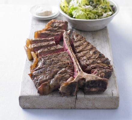 Chargrilled steak with English lettuce and herb salad and anchovy butter