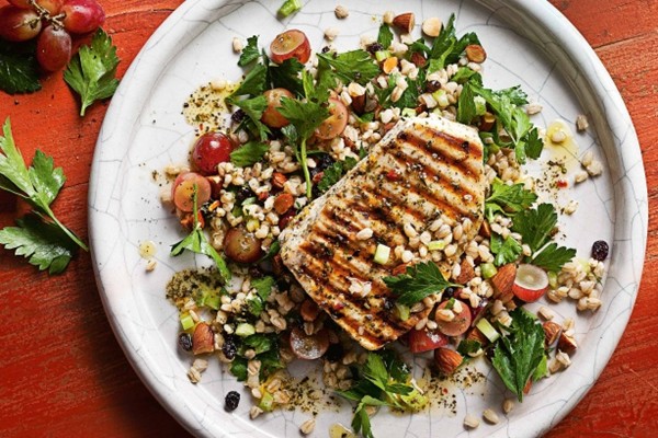 Chargrilled swordfish with grape, almond & barley salad