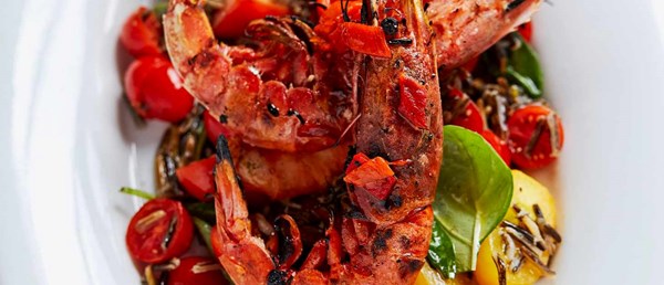 Chargrilled tiger prawns, black rice and roast chilli salsa