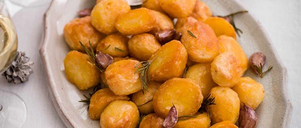 Charlotte's garlic and rosemary roasties