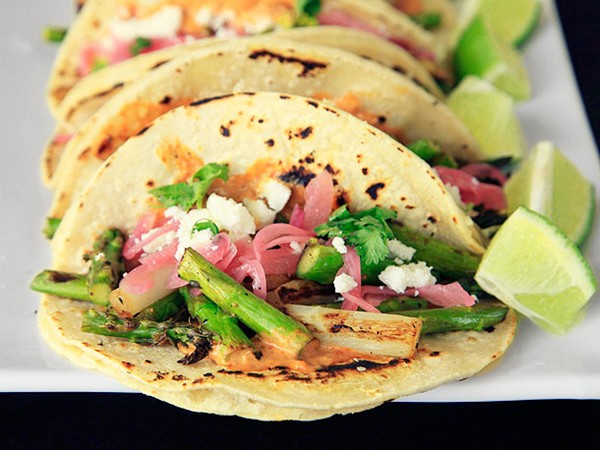 Charred asparagus tacos with creamy adobo and pickled red onions
