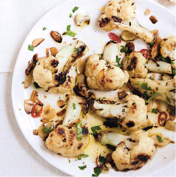 Charred baby cauliflower with cumin, chilli and almonds