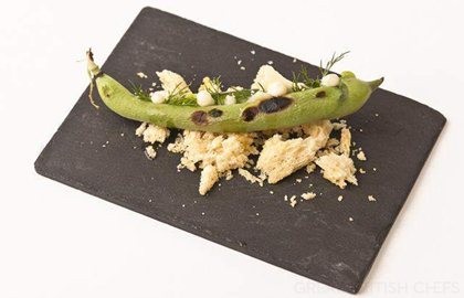 Charred broad beans with S. Jorge cheese and brioche crumbs