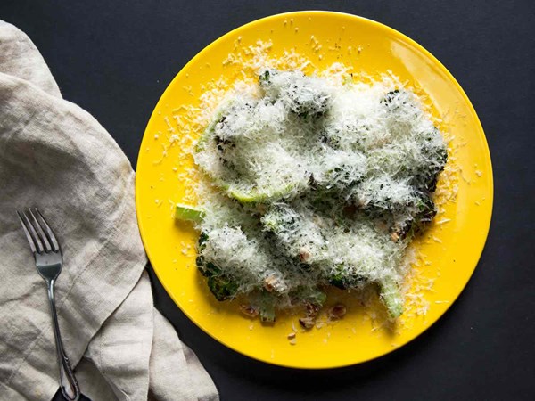 Charred broccoli with Manchego, hazelnuts, and honey