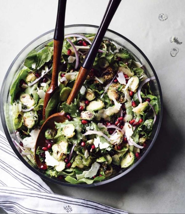 Charred Brussels sprouts with pomegranate, pecorino, and white balsamic vinaigrette