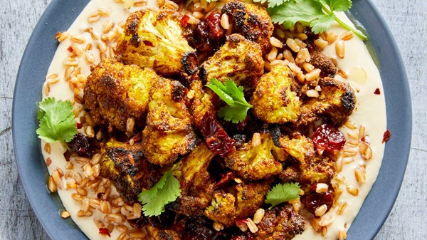 Charred cauliflower grain bowls with farro and soubise [Erica Collins]