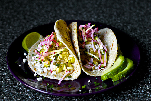 Charred corn tacos with zucchini-radish slaw