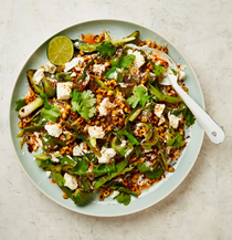 Charred corn with lime crema and hot sauce
