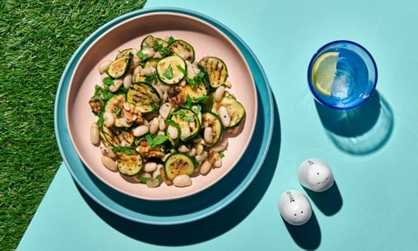 Charred courgette, white bean, walnut and mint salad