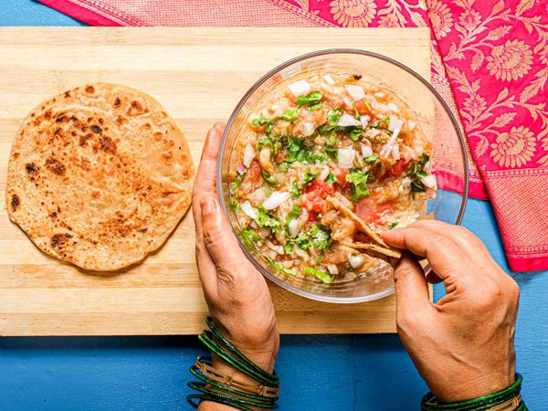 Charred eggplant with garlic and tomatoes (Baigan chokha)