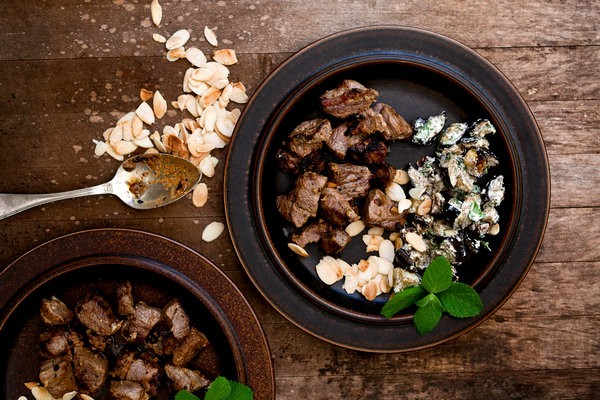 Charred lamb and eggplant with date-yogurt chutney