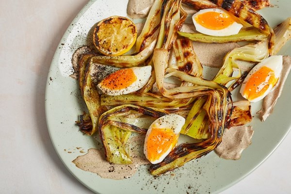  Charred leeks with leek ash crème fraîche, burnt citrus dressing and soft egg