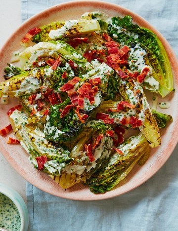 Charred lettuce with ranch dressing and bacon bits