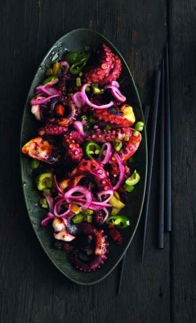 Charred octopus with chorizo oil and jalapeño pickled onions