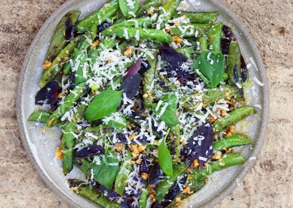 Charred peas with lemon and Parmesan dressing