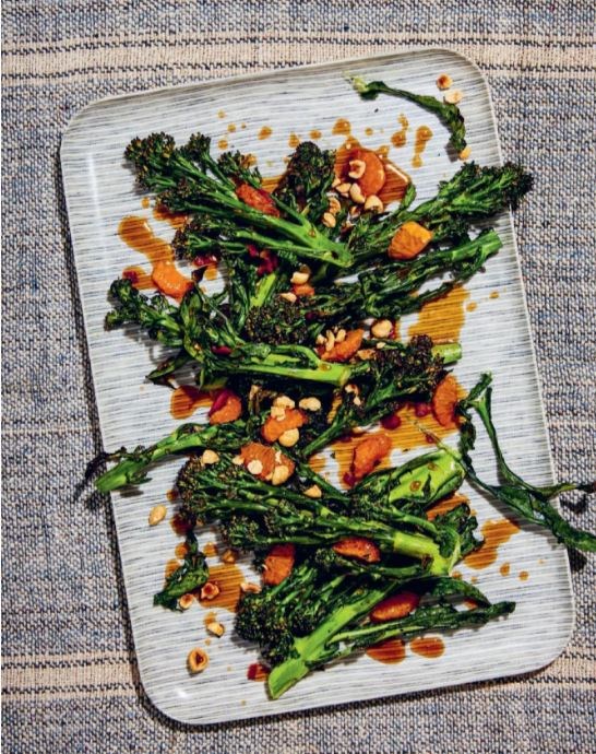 Charred purple sprouting broccoli with spicy fish sauce and clementine caramel