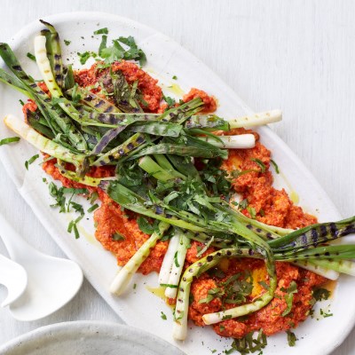 Charred salad onions with romesco sauce