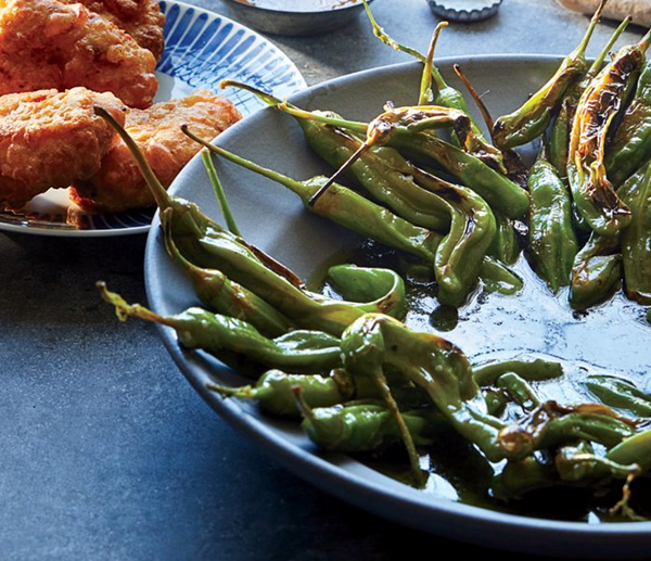 Charred shishito peppers with garlic-herb oil