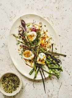 Charred spring onions with herby breadcrumbs