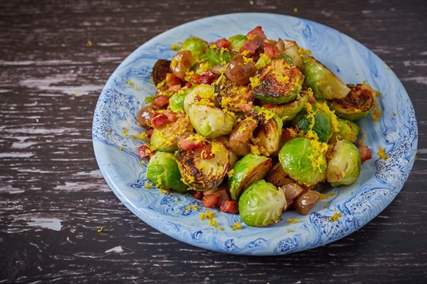 Charred sprouts with orange zest, chestnuts and pancetta