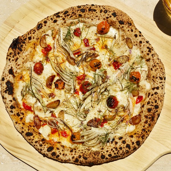 Charred Sun Gold tomato and fennel pizza