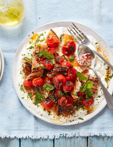 Charred tomatoes with sourdough, mint and pomegranate molasses