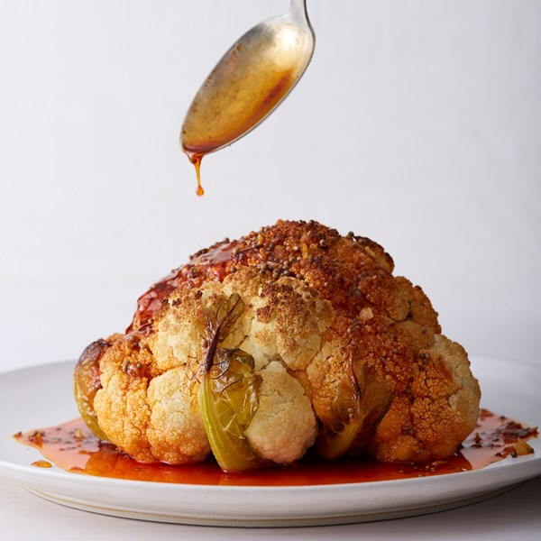 Charred whole cauliflower with mustard seeds 