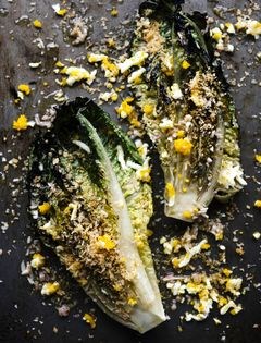Charred whole romaine with hard-boiled egg, anchovy vinaigrette, and garlic bread crumbs