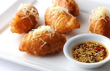 Cheddar beignets with sesame dressing