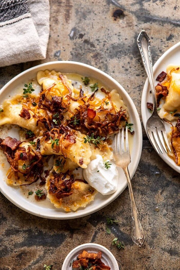 Cheddar pierogies with caramelized onions and bacon