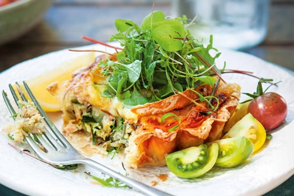 Cheese & Brussels sprout quiches with baby herb salad