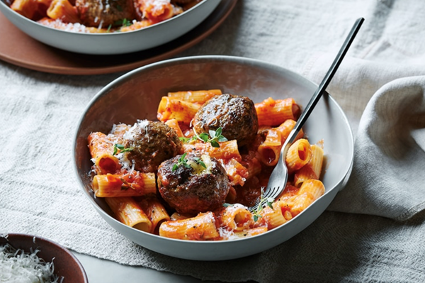 Cheese and pesto stuffed meatballs al forno