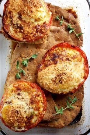 Cheese-baked egg-stuffed tomatoes