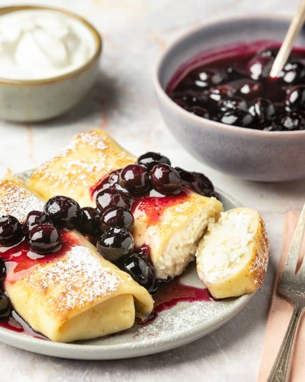 Cheese blintz with blueberry compote