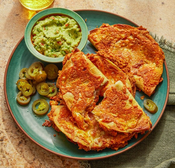 Cheese-crisped pinto bean quesadillas
