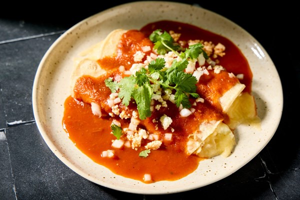 Cheese enchiladas with salsa roja