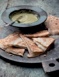 Cheese quesadillas with a green mole sauce