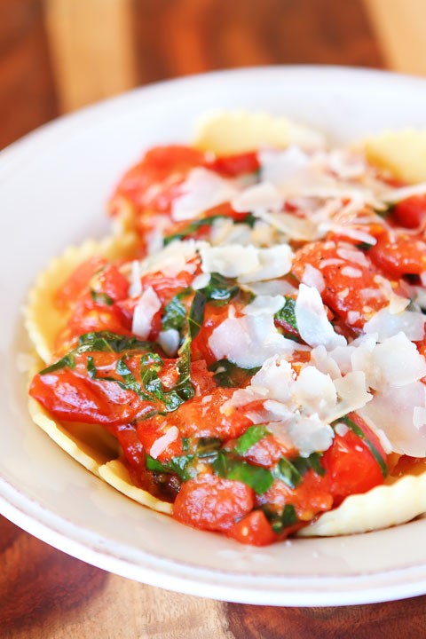 Cheese ravioli with brown butter and fresh tomato sauce