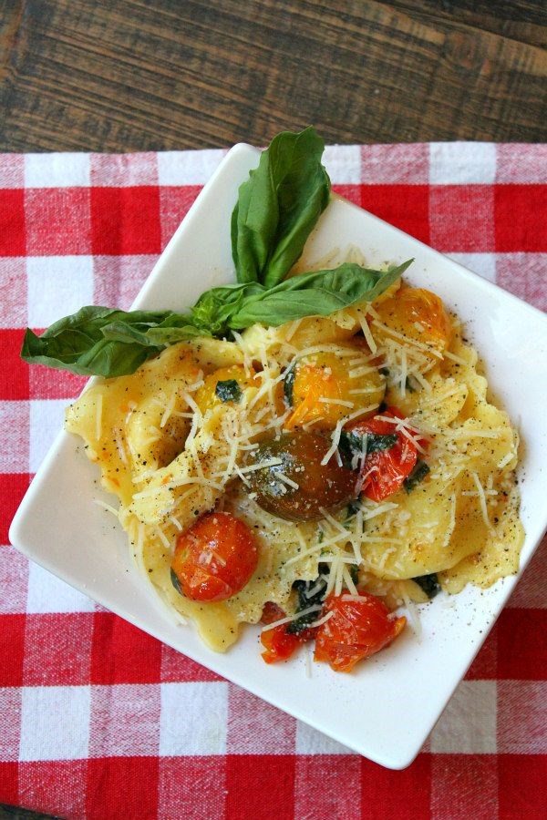 Cheese ravioli with brown butter and fresh tomato sauce