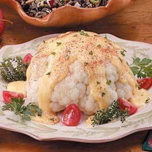 Cheese sauce over cauliflower