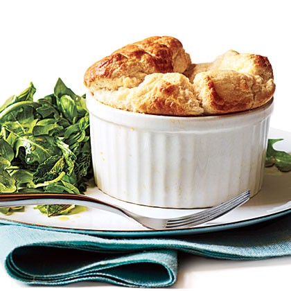 Cheese soufflés with herb salad