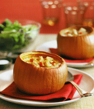 Cheese soup in little pumpkin shells