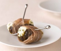 Cheese-stuffed dates with prosciutto