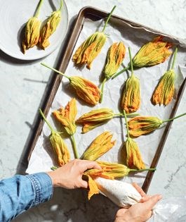 Cheese-stuffed fried squash blossoms