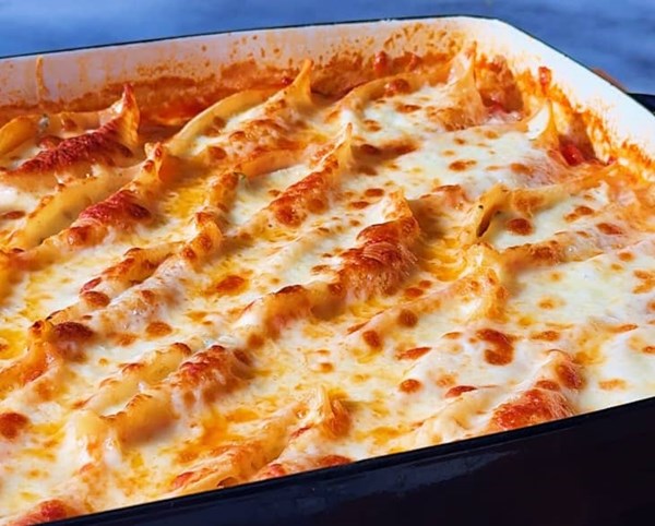 Cheese-stuffed pasta shells doused with saucy summer veg