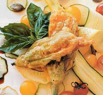 Cheese-stuffed squash blossoms with shaved baby squash and toasted pumpkin seeds