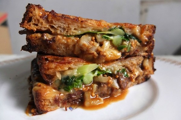 Cheese toastie with beef cheek, cauliflower leaves and pickled mustard seeds