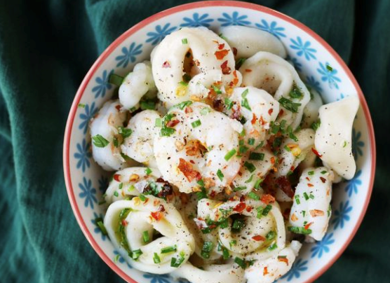 Cheese tortellini with shrimp and chives